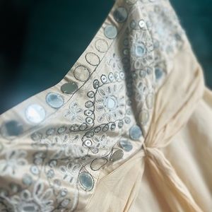 BCBG MAXAZRIA 
Baby Doll dress 
100% Silk 
Embroidery details